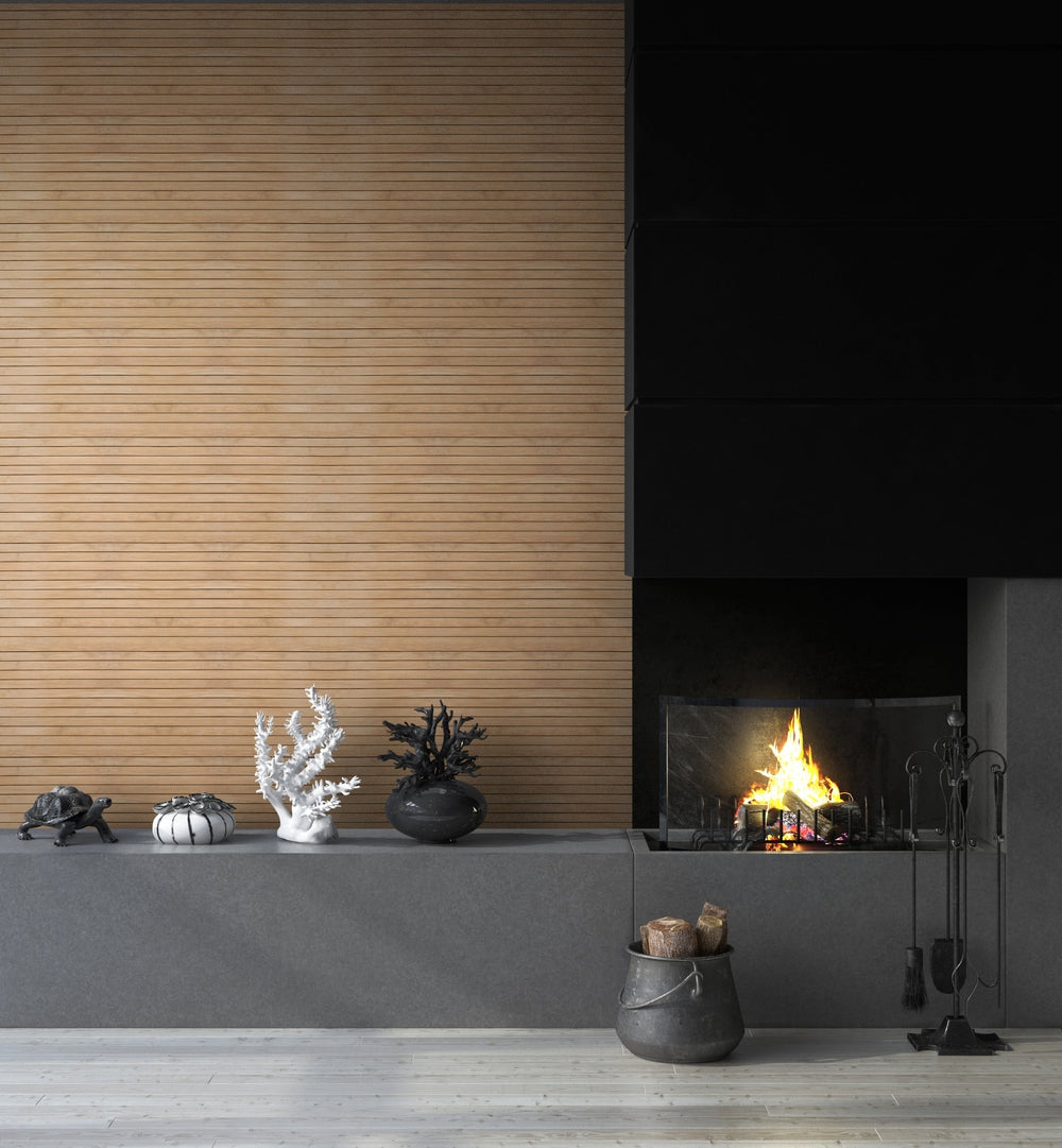 Modern fireplace with decorative objects and wood logs