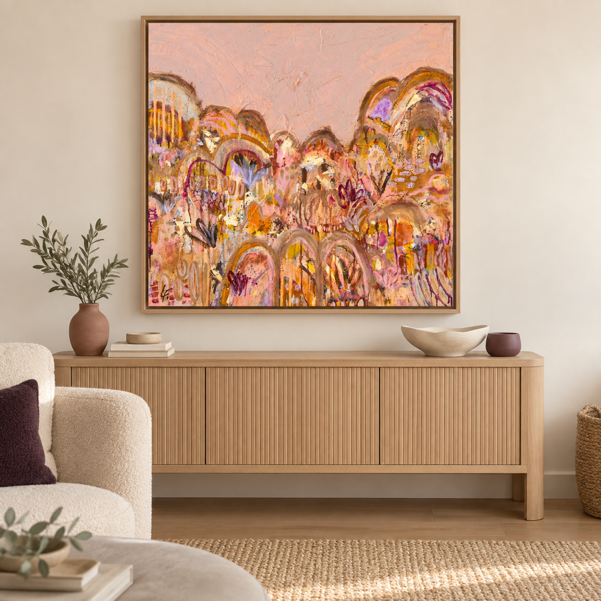 Echos of the outback by Lindy Farley in an oak frame above a contemporary oak console with clay and ivory ceramics.
