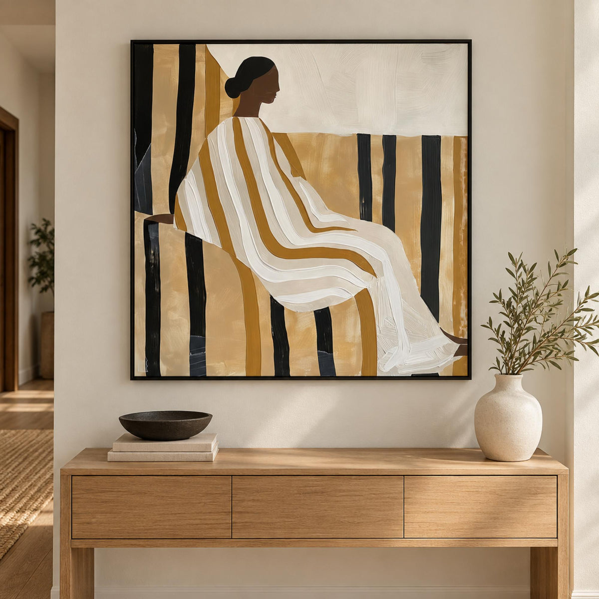 Lady In Stripes wall art above a refined contemporary hallway console