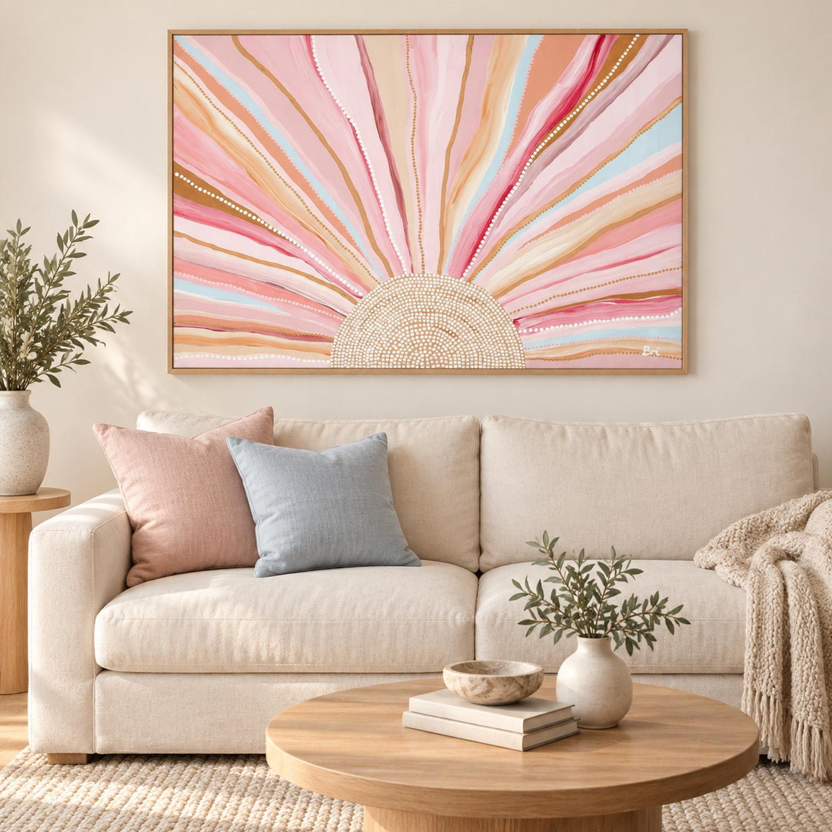 Rising Sun, Soft Pastel Tones wall art styled above a cream sofa