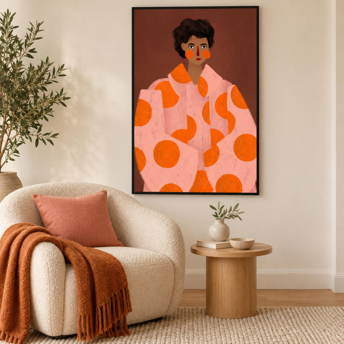 Woman With Orange Dots wall art in a bright contemporary reading corner
