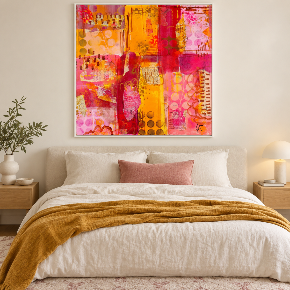 Brave and Unseen by Lindy Farley in a white frame above a cream bed styled with rose and ochre textiles.
