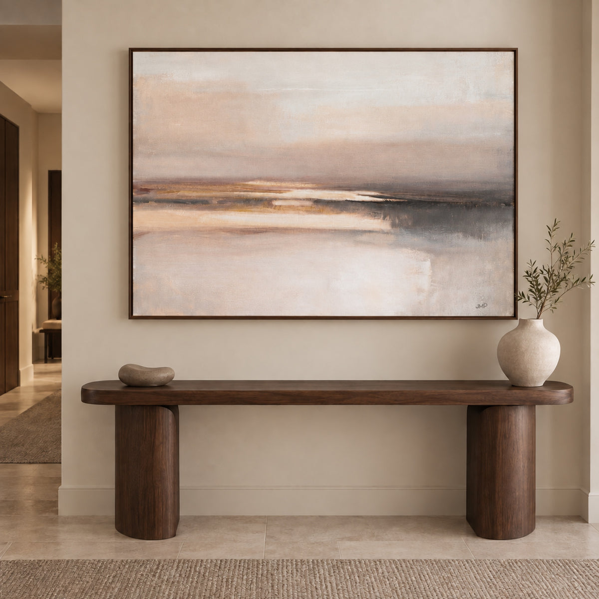 Mirage in a walnut frame centred above a sculptural walnut console table with understated ceramics.