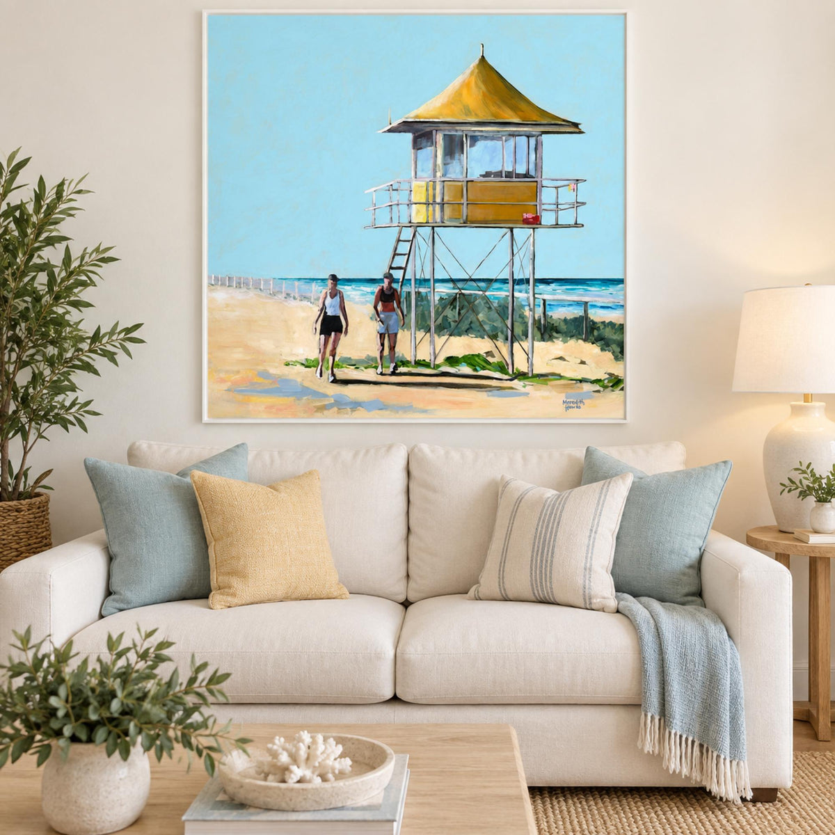 Gold Coast wall art styled in a light Hamptons living room