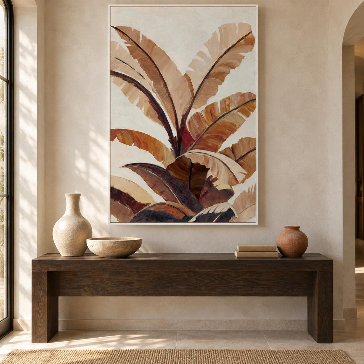 Golden Banana Leaf by Jacob Q in a white floating frame above a dark oak console in a contemporary earthy entryway.