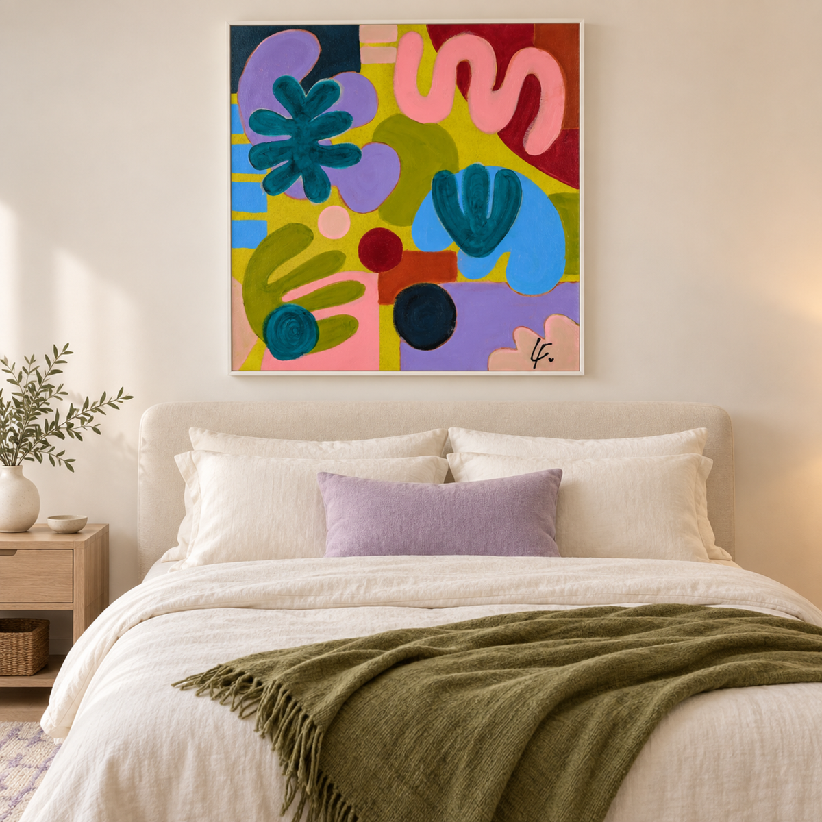 Harmonious Diversity by Lindy Farley in a white frame above a cream bed with lilac and olive textiles.