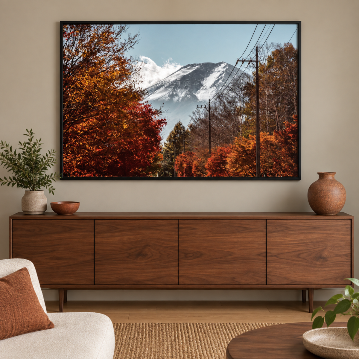 Monolith mountain wall art above a walnut buffet
