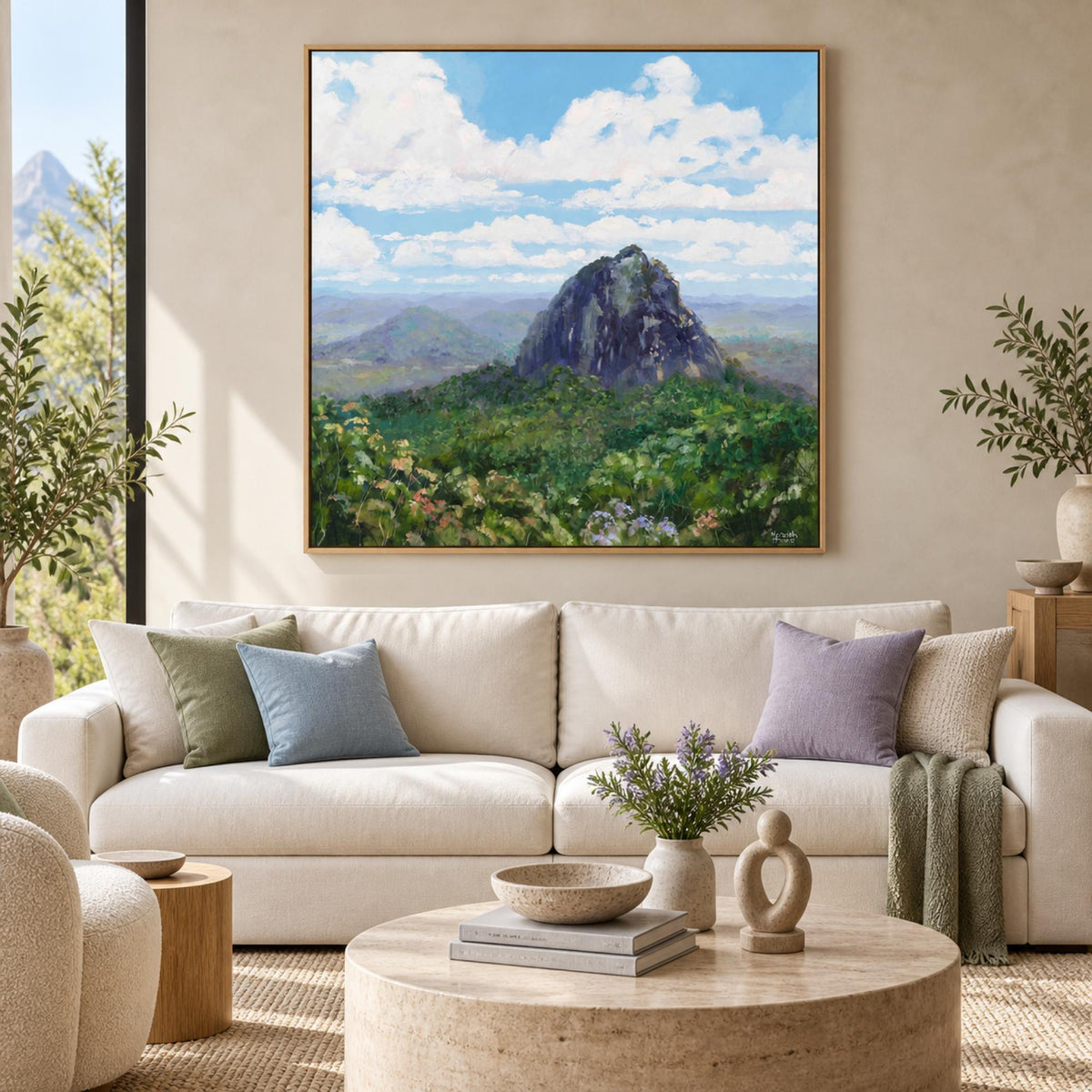 Mount Tibrogargan in an oak floating frame above a contemporary neutral sofa