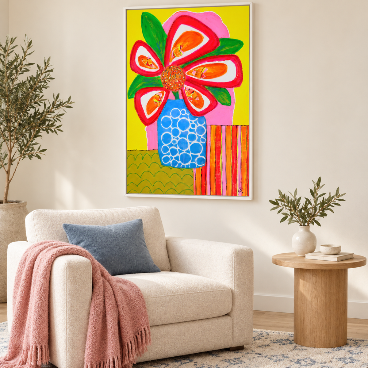 Polly and the Candy Stripes by Lindy Farley in a white frame above a cream chair with blue and pink textiles.