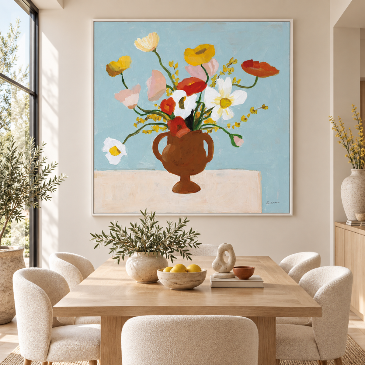 Popping floral artwork in a white floating frame in a contemporary dining room