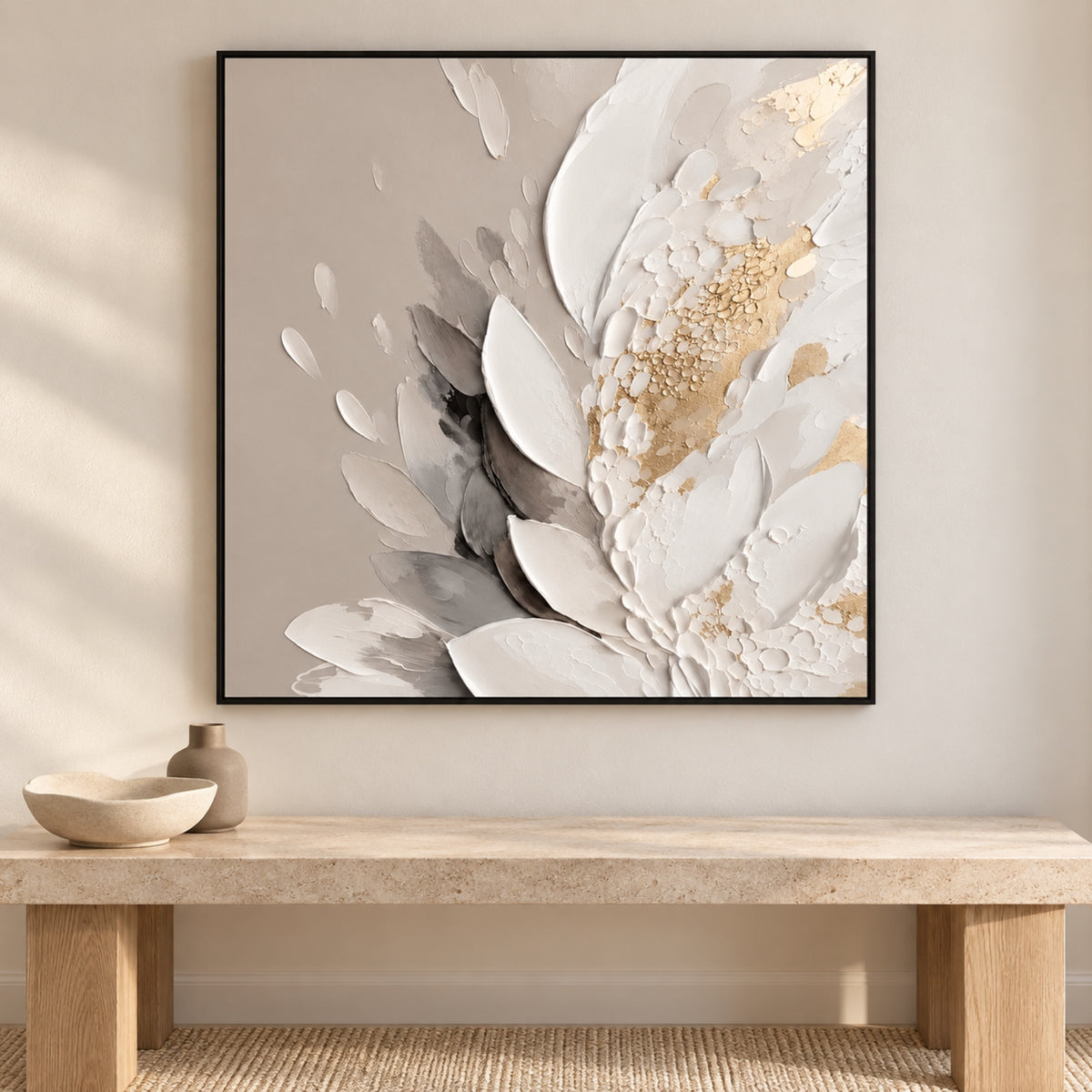 Porcelain Bloom by Bella Eve in a slim black frame above a pale stone and oak console with neutral sculptural ceramics.