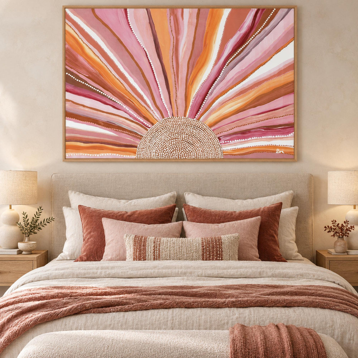 Rising Sun Bold Earthy Tones wall art centred above a warm neutral bedhead