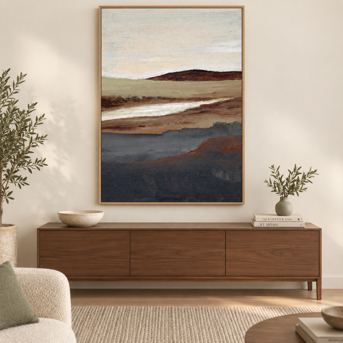 Serene View in a natural oak frame above a walnut console with ivory and sage ceramics.