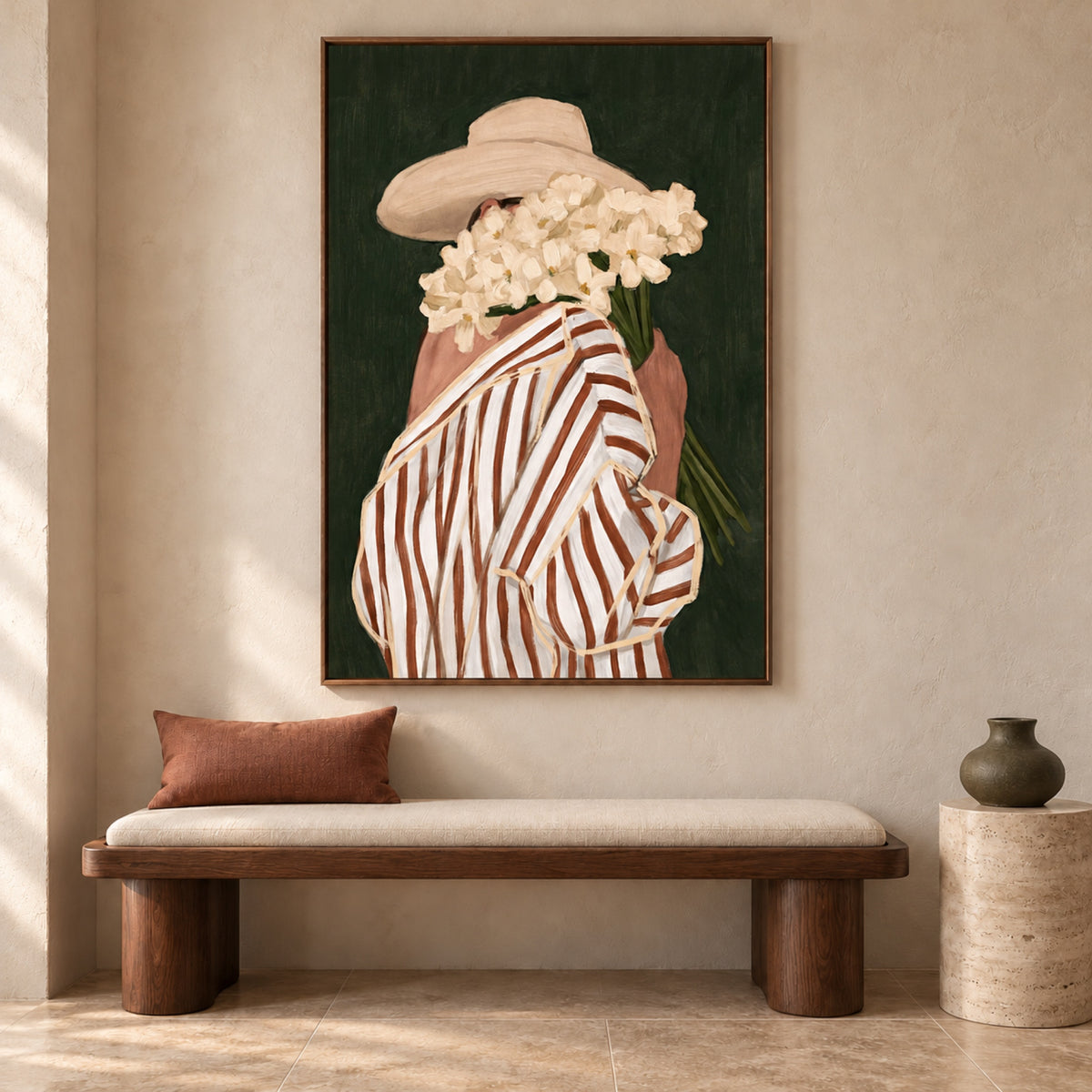 Sunday Cuttings by Lady Hana in a slim walnut frame above a sculptural walnut bench with ivory upholstery, a terracotta cushion and olive ceramic on a travertine plinth.