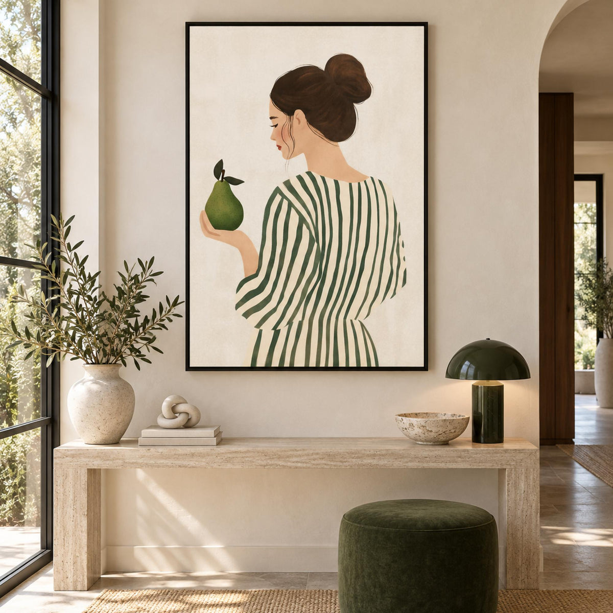 Woman With Green Pear in a black floating frame above a contemporary hallway console